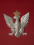 Example of a silver embroidered eagle on the back of the throne